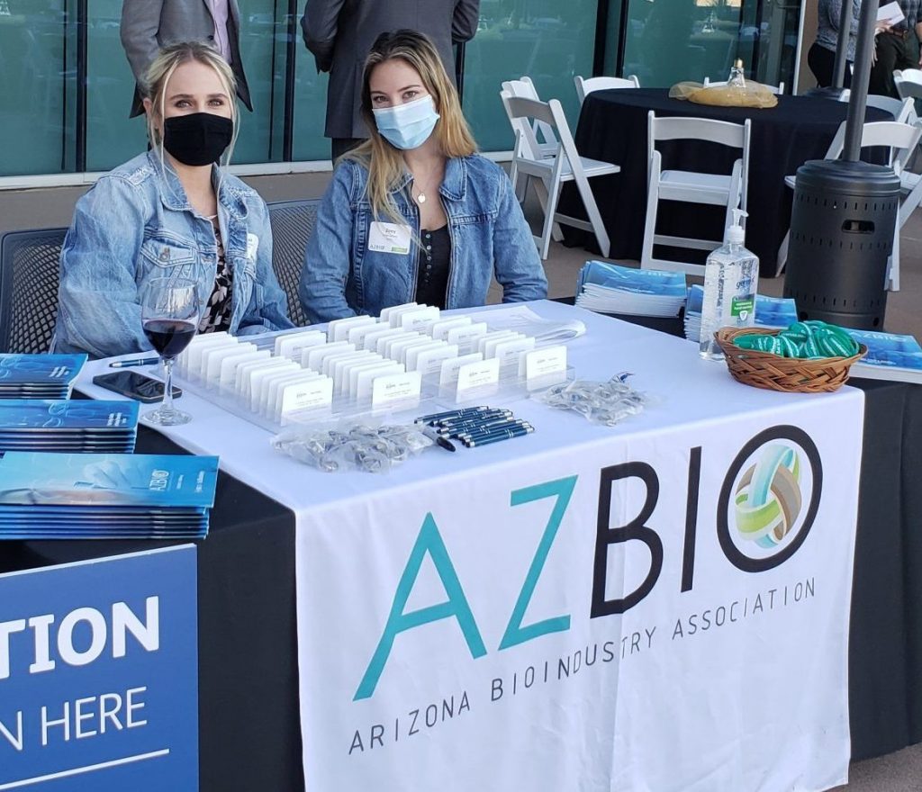 Abigail and Zoey welcome guests at the AZBio 2022 Kickoff at BD in Tempe.